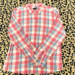 UNTUCKit brand button down in pink and blue.